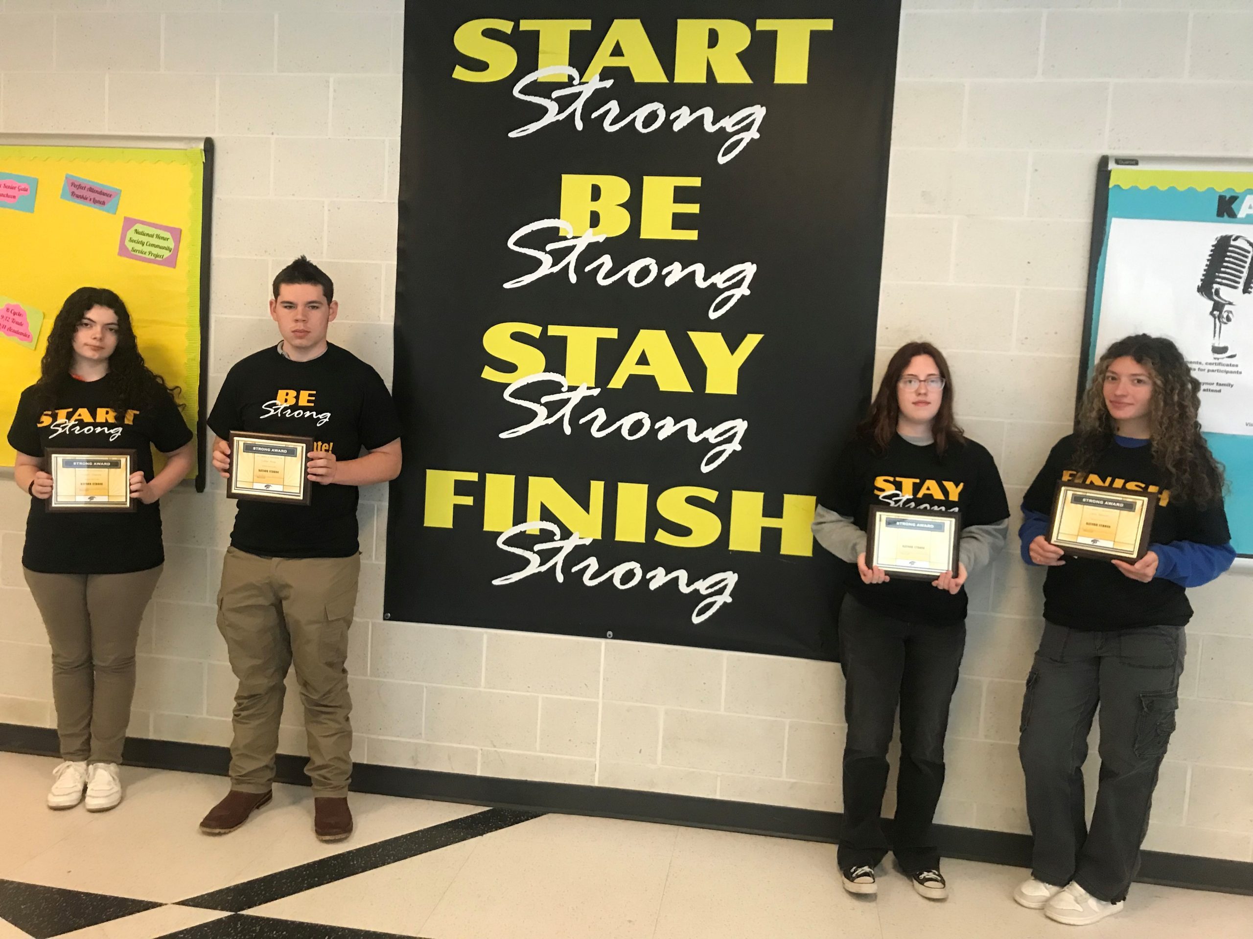STRONG award winners from March 2026 pose