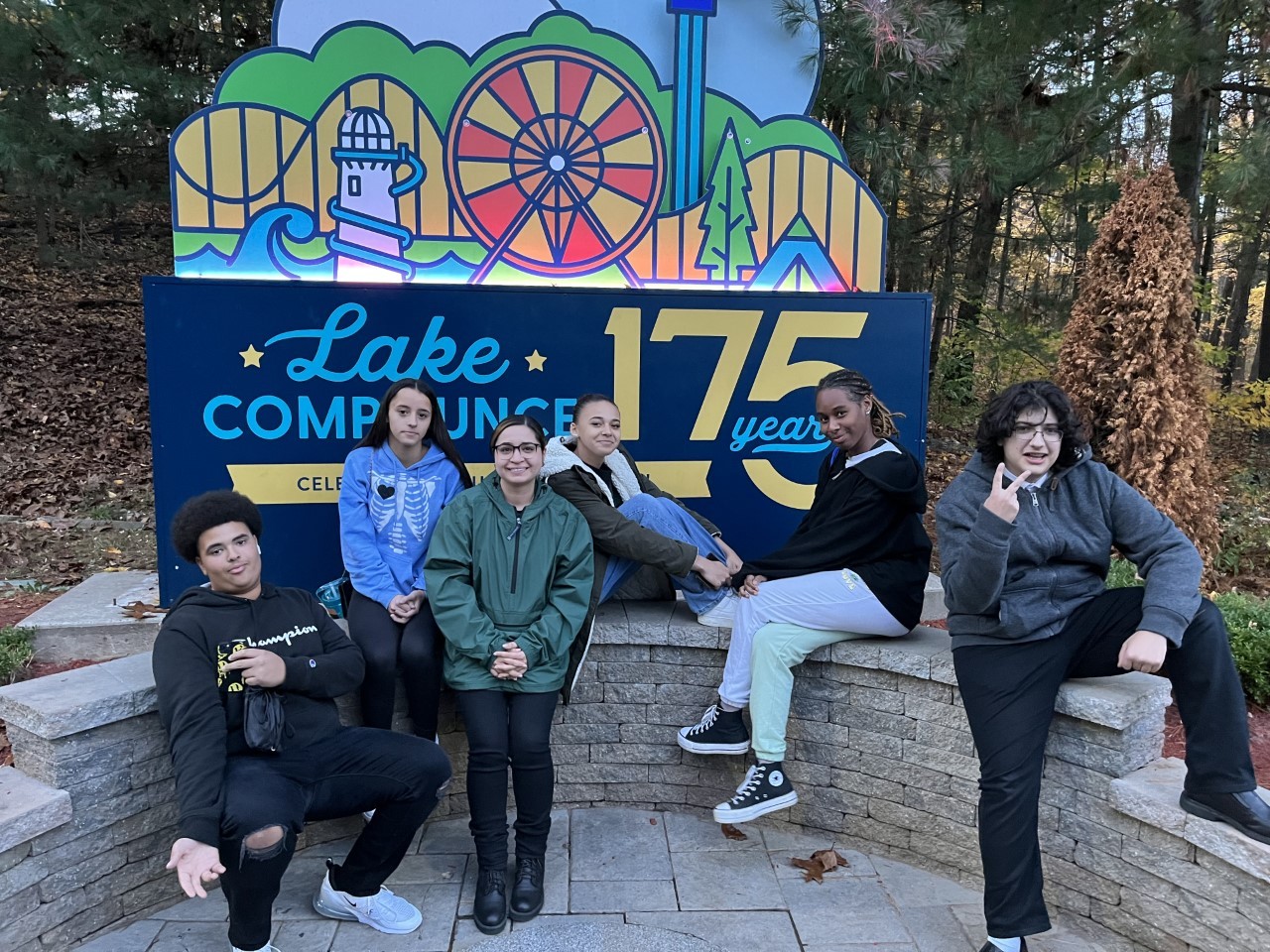 Class of 2025 students at entrance to Lake Compounce with Ms. Lopez
